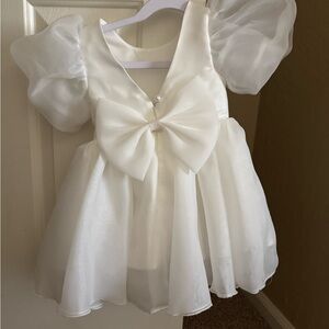 Elegant White Dress with Bow